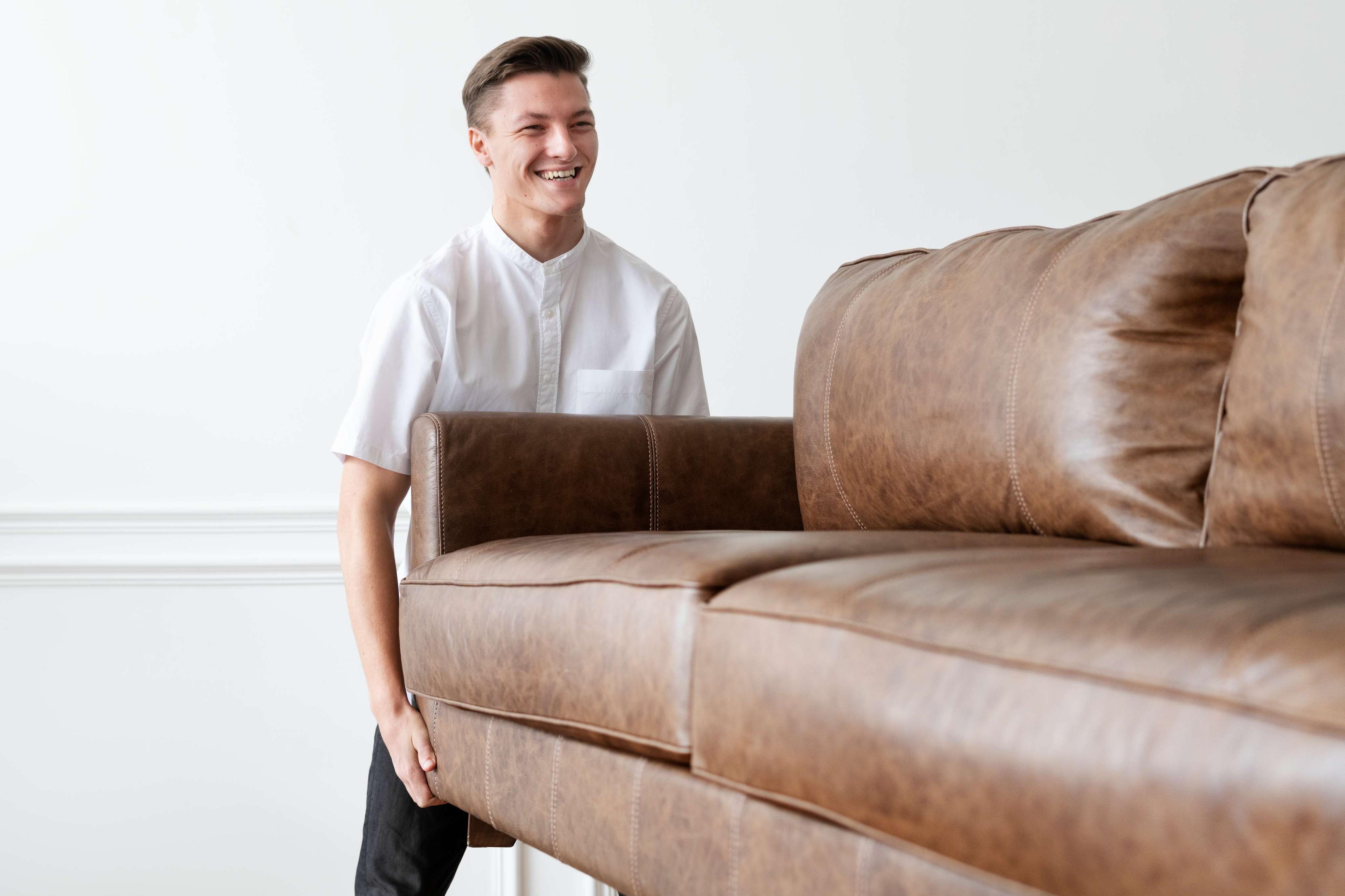 Worker moving furniture